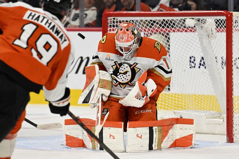 Jan 6, 2026; Philadelphia, Pennsylvania, USA; Anaheim Ducks goaltender Lukas Dostal (1) makes a save against Philadelphia Flyers right wing Garnet Hathaway (19) during the second period at Xfinity Mobile Arena. Mandatory Credit: Eric Hartline-Imagn Images