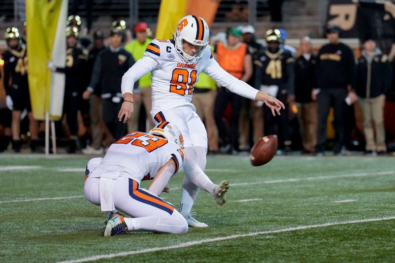 Nov 19, 2022; Winston-Salem, North Carolina, USA;  Syracuse Orange place kicker Andre Szmyt (91) kicks an extra point against the Wake Forest Demon Deacons during the first half at Truist Field. Mandatory Credit: Jim Dedmon-USA TODAY Sports