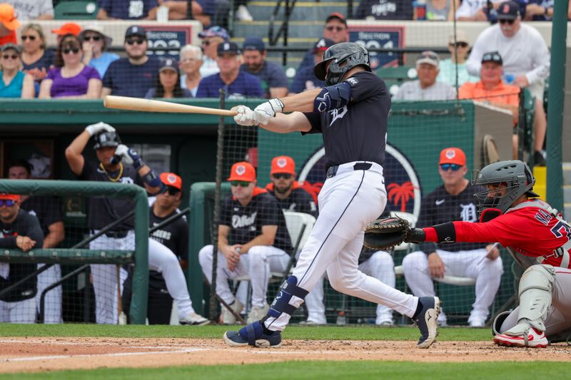 Feb 27, 2025; Lakeland, Florida, USA; Detroit Tigers catcher Jake Rogers (34) bats during the second inning against the Boston Red Sox at Publix Field at Joker Marchant Stadium. Mandatory Credit: Mike Watters-Imagn Images