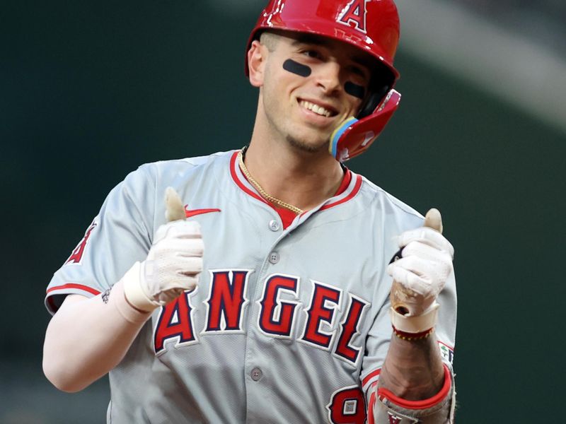 May 17, 2024; Arlington, Texas, USA; Los Angeles Angels shortstop Zach Neto (9) reacts as he rounds the bases after hitting a two-run home run in the fourth inning against the Texas Rangers at Globe Life Field. Mandatory Credit: Tim Heitman-USA TODAY Sports