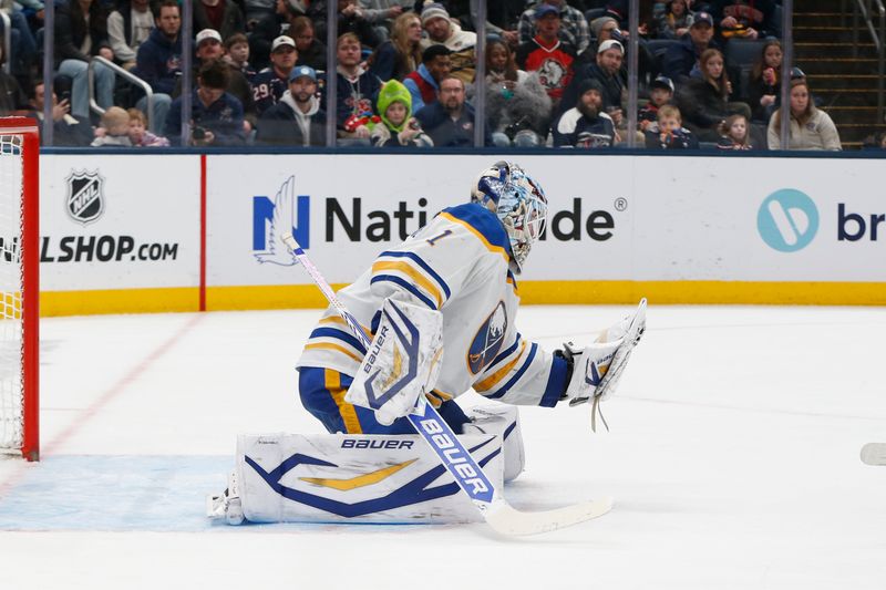 Jan 3, 2026; Columbus, Ohio, USA; Buffalo Sabres goalie Ukko-Pekka Luukkonen (1) makes a glove save against the Columbus Blue Jackets during the second period at Nationwide Arena. Mandatory Credit: Russell LaBounty-Imagn Images