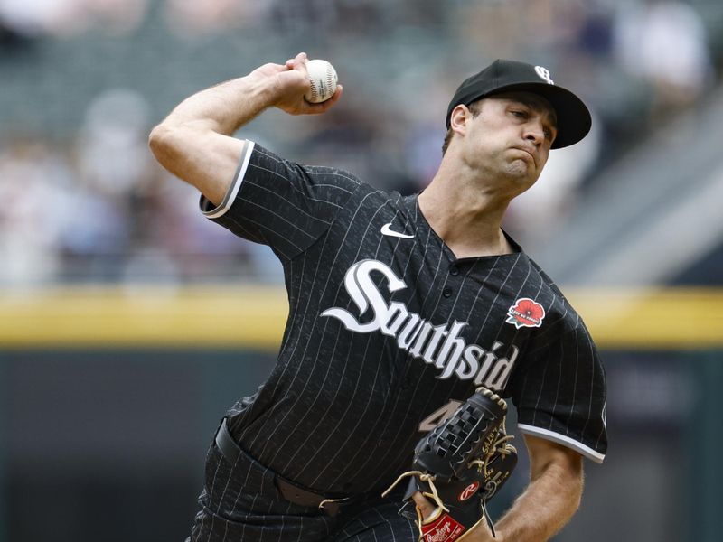 May 27, 2024; Chicago, Illinois, USA; Chicago White Sox starting pitcher Nick Nastrini (43) delivers a pitch against the Toronto Blue Jays during the first inning at Guaranteed Rate Field. Mandatory Credit: Kamil Krzaczynski-USA TODAY Sports