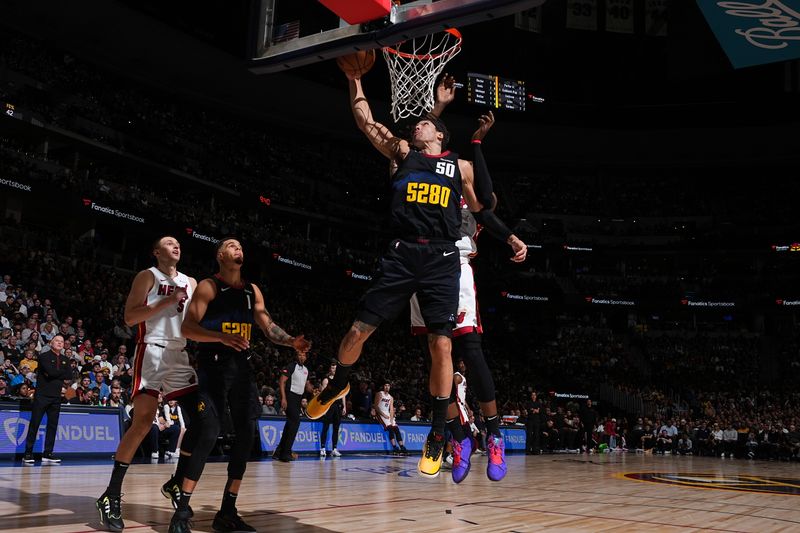 DENVER, CO - FEBRUARY 29: Aaron Gordon #50 of the Denver Nuggets shoots the ball during the game against the Miami Heat on February 29, 2024 at the Ball Arena in Denver, Colorado. NOTE TO USER: User expressly acknowledges and agrees that, by downloading and/or using this Photograph, user is consenting to the terms and conditions of the Getty Images License Agreement. Mandatory Copyright Notice: Copyright 2024 NBAE (Photo by Garrett Ellwood/NBAE via Getty Images)