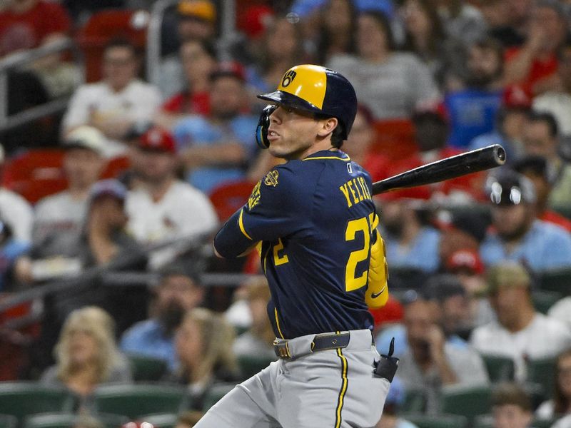 Apr 25, 2025; St. Louis, Missouri, USA;  Milwaukee Brewers designated hitter Christian Yelich (22) hits a one run single against the St. Louis Cardinals during the sixth inning at Busch Stadium. Mandatory Credit: Jeff Curry-Imagn Images