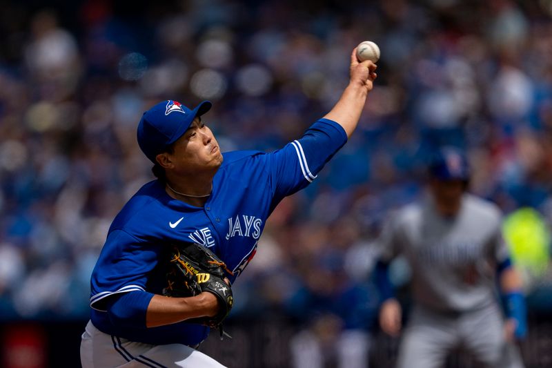 Aug 13, 2023; Toronto, Ontario, CAN; Toronto Blue Jays starting pitcher Hyun Jin Ryu (99) pitches to the Chicago Cubs during the first inning at Rogers Centre. Mandatory Credit: Kevin Sousa-USA TODAY Sports