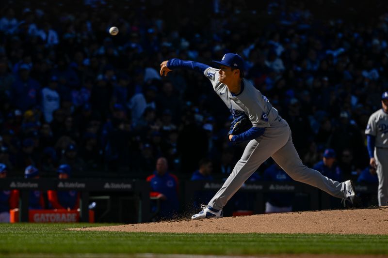 Apr 6, 2024; Chicago, Illinois, USA;  Los Angeles Dodgers pitcher Yoshinobu Yamamoto (18) delivers against the Chicago Cubs during the first inning at Wrigley Field. Mandatory Credit: Matt Marton-USA TODAY Sports