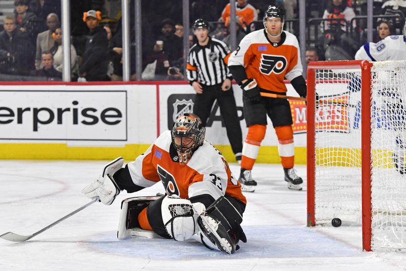 Feb 27, 2024; Philadelphia, Pennsylvania, USA; Philadelphia Flyers goaltender Samuel Ersson (33) reacts after allowing a goal against the Tampa Bay Lightning during the second period at Wells Fargo Center. Mandatory Credit: Eric Hartline-USA TODAY Sports