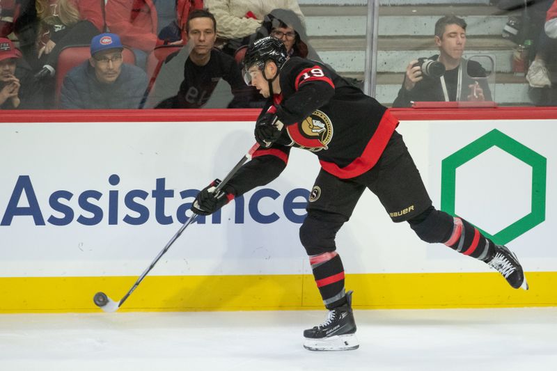 Nov 24 2023; Ottawa, Ontario, CAN; Ottawa Senators right wing Drake Batherson (19) shoots the puck in the third period againstthe New York Islanders at the Canadian Tire Centre. Mandatory Credit: Marc DesRosiers-USA TODAY Sports