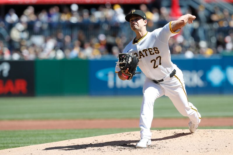 Apr 7, 2024; Pittsburgh, Pennsylvania, USA;  Pittsburgh Pirates starting pitcher Marco Gonzales (27) delivers a pitch against the Baltimore Orioles during the second  inning at PNC Park. Mandatory Credit: Charles LeClaire-USA TODAY Sports