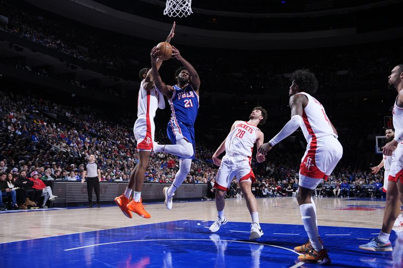 PHILADELPHIA, PA - JANUARY 15: Joel Embiid #21 of the Philadelphia 76ers drives to the basket during the game against the Houston Rockets on January 15, 2024 at the Wells Fargo Center in Philadelphia, Pennsylvania NOTE TO USER: User expressly acknowledges and agrees that, by downloading and/or using this Photograph, user is consenting to the terms and conditions of the Getty Images License Agreement. Mandatory Copyright Notice: Copyright 2024 NBAE (Photo by Jesse D. Garrabrant/NBAE via Getty Images)