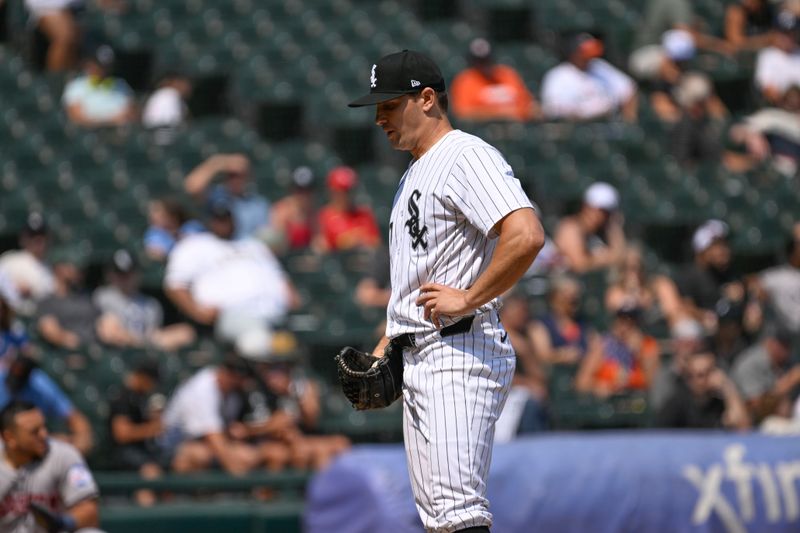 Jun 20, 2024; Chicago, Illinois, USA;  Chicago White Sox pitcher Tanner Banks (57) looks on after the Houston Astros scored during the seventh inningb at Guaranteed Rate Field. Mandatory Credit: Matt Marton-USA TODAY Sports