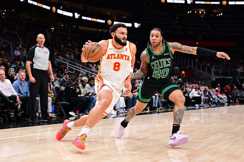 ATLANTA, GA - NOVEMBER 4: David Roddy #8 of the Atlanta Hawks handles the ball during the game against the Boston Celtics on November 4, 2024 at State Farm Arena in Atlanta, Georgia.  NOTE TO USER: User expressly acknowledges and agrees that, by downloading and/or using this Photograph, user is consenting to the terms and conditions of the Getty Images License Agreement. Mandatory Copyright Notice: Copyright 2024 NBAE (Photo by Adam Hagy/NBAE via Getty Images)