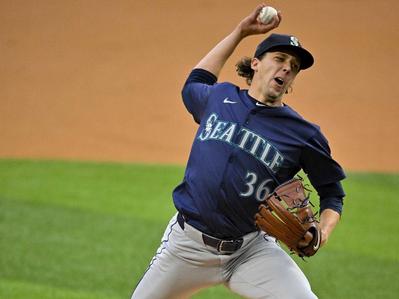 Apr 23, 2024; Arlington, Texas, USA; Seattle Mariners starting pitcher Logan Gilbert (36) pitches against the Texas Rangers during the first inning at Globe Life Field. Mandatory Credit: Jerome Miron-USA TODAY Sports