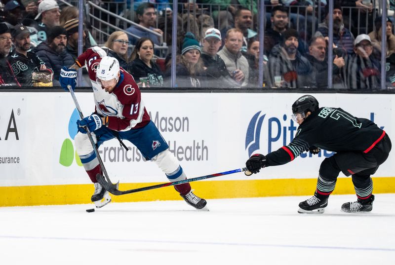 Mar 12, 2026; Seattle, Washington, USA; Colorado Avalanche forward Valeri Nichushkin (13) skates against Seattle Krakenforward Jordan Eberle (7) during the first period at Climate Pledge Arena. Mandatory Credit: Stephen Brashear-Imagn Images