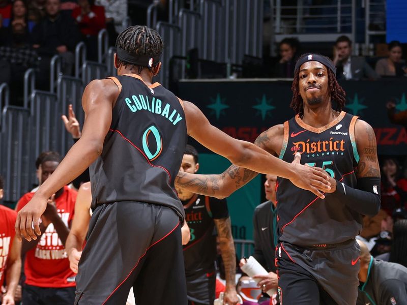 WASHINGTON, DC -? FEBRUARY 2: Delon Wright #55 and Bilal Coulibaly #0 of the Washington Wizards high five during the game against the Miami Heat on February 2, 2024 at Capital One Arena in Washington, DC. NOTE TO USER: User expressly acknowledges and agrees that, by downloading and or using this Photograph, user is consenting to the terms and conditions of the Getty Images License Agreement. Mandatory Copyright Notice: Copyright 2024 NBAE (Photo by Kenny Giarla/NBAE via Getty Images)