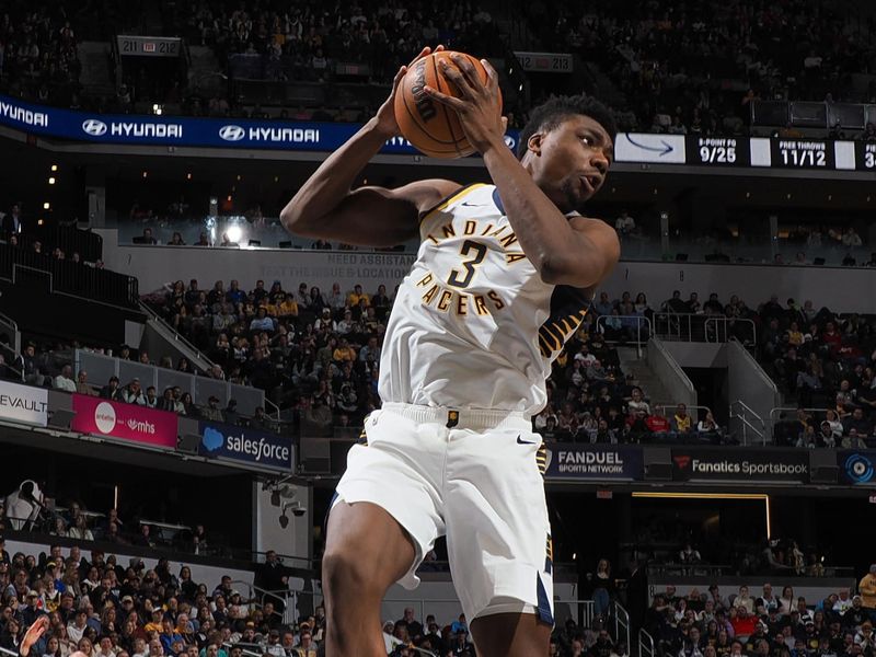 INDIANAPOLIS, IN - FEBRUARY 1: Moses Brown #3 of the Indiana Pacers rebounds the ball during the game against the Atlanta Hawks on February 1, 2025 at Gainbridge Fieldhouse in Indianapolis, Indiana. NOTE TO USER: User expressly acknowledges and agrees that, by downloading and or using this Photograph, user is consenting to the terms and conditions of the Getty Images License Agreement. Mandatory Copyright Notice: Copyright 2025 NBAE (Photo by Ron Hoskins/NBAE via Getty Images)