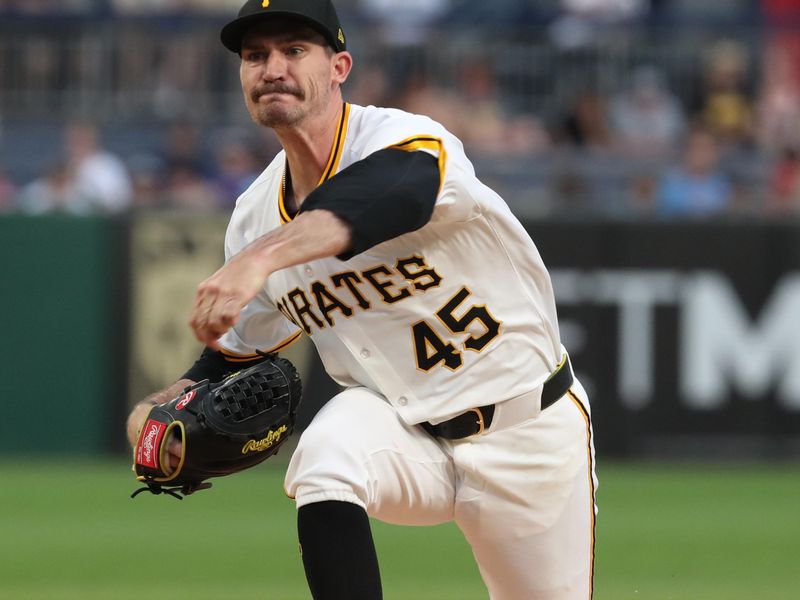 Jun 30, 2025; Pittsburgh, Pennsylvania, USA;  Pittsburgh Pirates starting pitcher Andrew Heaney (45) delivers a pitch against the St. Louis Cardinals during the first inning at PNC Park. Mandatory Credit: Charles LeClaire-Imagn Images