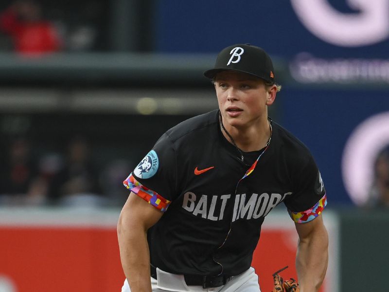 Aug 14, 2024; Baltimore, Maryland, USA; Baltimore Orioles second baseman Jackson Holliday (7) breaks on a second inning ground ball against the Washington Nationals  at Oriole Park at Camden Yards. Mandatory Credit: Tommy Gilligan-USA TODAY Sports