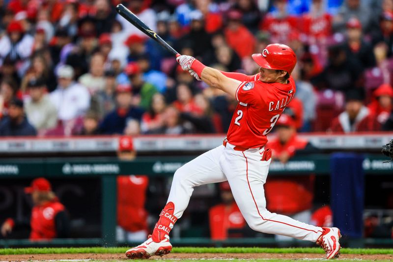 May 3, 2025; Cincinnati, Ohio, USA; Cincinnati Reds outfielder Tyler Callihan (32) hits a RBI single in the second inning against the Washington Nationals at Great American Ball Park. Mandatory Credit: Katie Stratman-Imagn Images