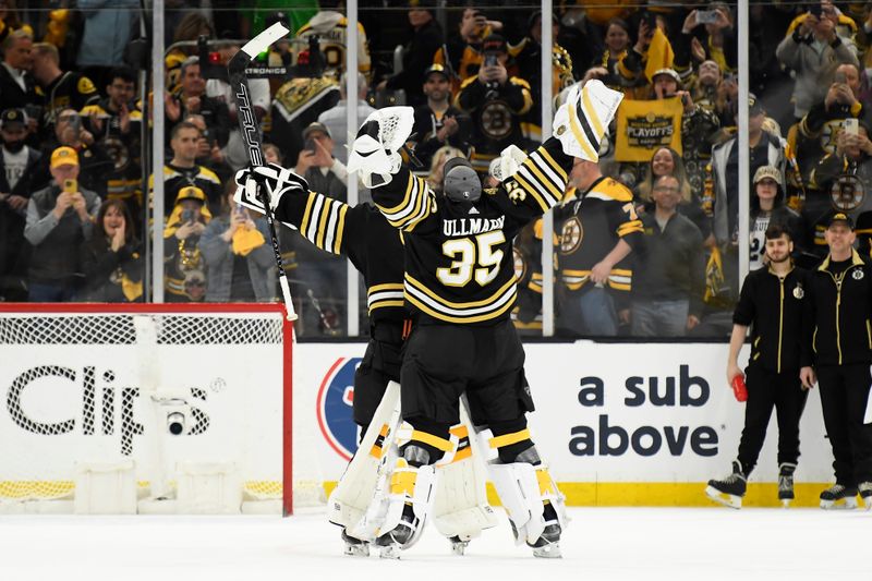 Apr 20, 2024; Boston, Massachusetts, USA; Boston Bruins goaltender Jeremy Swayman (1) and goaltender Linus Ullmark (35) celebrate after defeating the Toronto Maple Leafs in game one of the first round of the 2024 Stanley Cup Playoffs at TD Garden. Mandatory Credit: Bob DeChiara-USA TODAY Sports