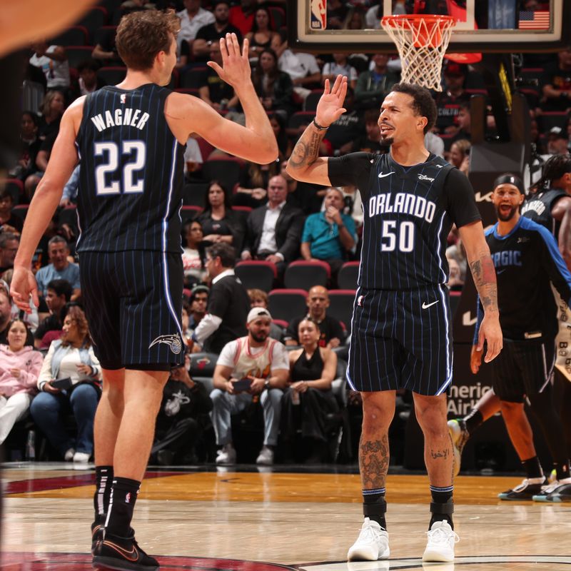 MIAMI, FL - OCTOBER 23: Franz Wagner #22 and Cole Anthony #50 of the Orlando Magic high five during the game against the Miami Heat on October 23, 2024 at Kaseya Center in Miami, Florida. NOTE TO USER: User expressly acknowledges and agrees that, by downloading and or using this Photograph, user is consenting to the terms and conditions of the Getty Images License Agreement. Mandatory Copyright Notice: Copyright 2024 NBAE (Photo by Issac Baldizon/NBAE via Getty Images)