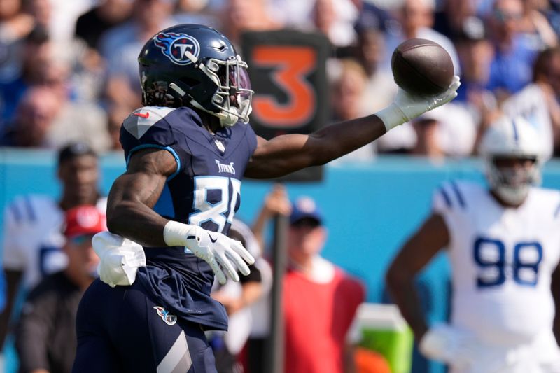 Tennessee Titans tight end Chig Okonkwo makes a catch during the first half of an NFL football game against the Indianapolis Colts, Sunday, Oct. 13, 2024, in Nashville, Tenn. (AP Photo/George Walker IV)