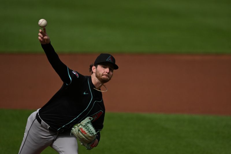 May 11, 2024; Baltimore, Maryland, USA;  Arizona Diamondbacks pitcher Ryne Nelson (19) throws a ]first inning pitch against the Baltimore Orioles at Oriole Park at Camden Yards. Mandatory Credit: Tommy Gilligan-USA TODAY Sports