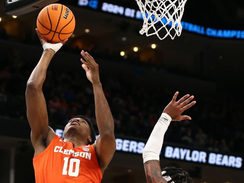 Mar 24, 2024; Memphis, TN, USA; Clemson Tigers forward RJ Godfrey (10) shoots against Baylor Bears forward Jalen Bridges (11) in the first half in the second round of the 2024 NCAA Tournament at FedExForum. Mandatory Credit: Petre Thomas-USA TODAY Sports