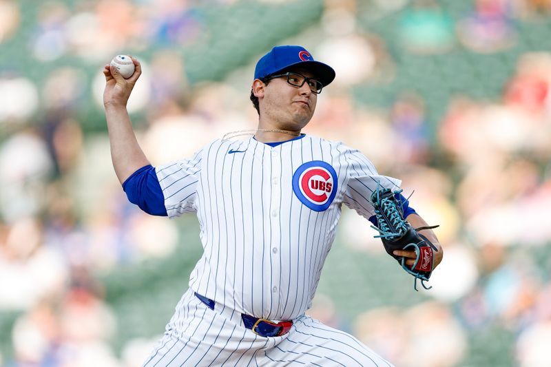 May 21, 2024; Chicago, Illinois, USA; Chicago Cubs starting pitcher Javier Assad (72) delivers a pitch against the Atlanta Braves during the first inning at Wrigley Field. Mandatory Credit: Kamil Krzaczynski-USA TODAY Sports