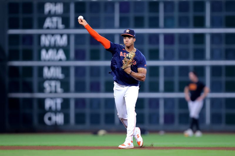 Sep 20, 2023; Houston, Texas, USA; Houston Astros shortstop Jeremy Pena (3) warms up before a game against the Baltimore Orioles at Minute Maid Park. Mandatory Credit: Erik Williams-USA TODAY Sports