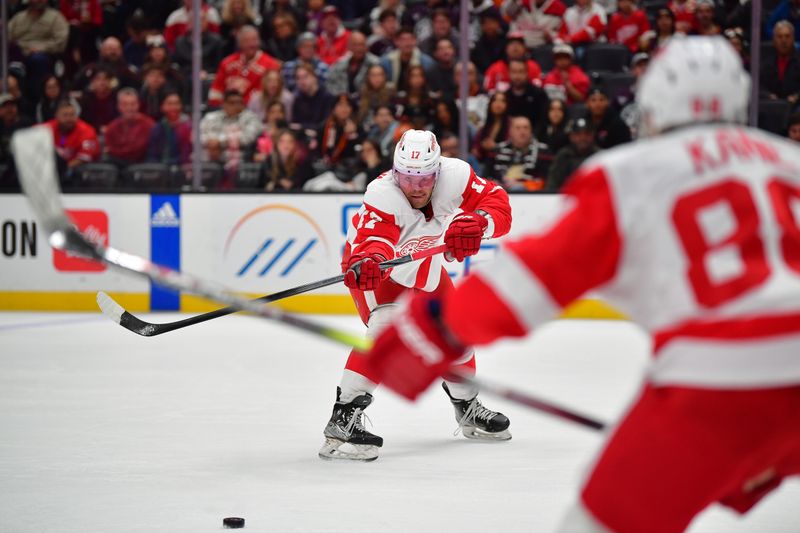 Jan 7, 2024; Anaheim, California, USA; Detroit Red Wings right wing Daniel Sprong (17) passes the puck to right wing Patrick Kane (88) against the Anaheim Ducks during the first period at Honda Center. Mandatory Credit: Gary A. Vasquez-USA TODAY Sports