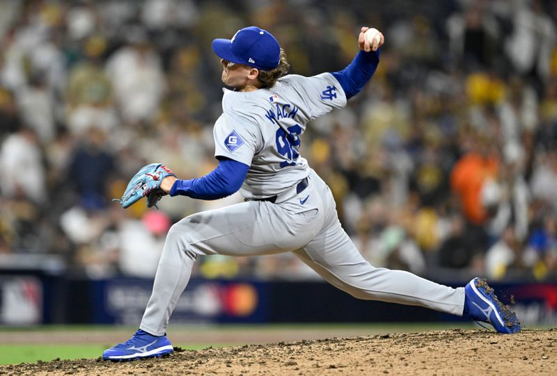 Oct 9, 2024; San Diego, California, USA; Los Angeles Dodgers pitcher Landon Knack (96) throws in the ninth inning against the San Diego Padres during game four of the NLDS for the 2024 MLB Playoffs at Petco Park.  Mandatory Credit: Denis Poroy-Imagn Images