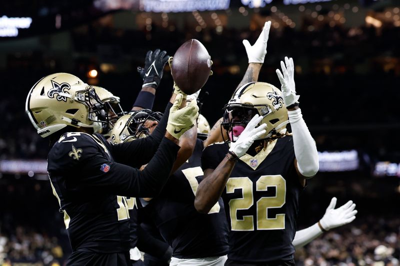 New Orleans Saints wide receiver Chris Olave (12) celebrates a touchdown against Atlanta Falcons in the second half of an NFL football game in New Orleans, Sunday, Jan. 7, 2024. (AP Photo/Butch Dill)