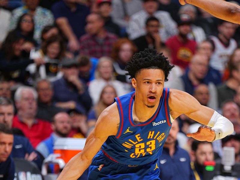 DENVER, CO - NOVEMBER 22: Trey Alexander #23 of the Denver Nuggets dribbles the ball during the game against the Dallas Mavericks during the Emirates NBA Cup game on November 22, 2024 at Ball Arena in Denver, Colorado. NOTE TO USER: User expressly acknowledges and agrees that, by downloading and/or using this Photograph, user is consenting to the terms and conditions of the Getty Images License Agreement. Mandatory Copyright Notice: Copyright 2024 NBAE (Photo by Garrett Ellwood/NBAE via Getty Images)