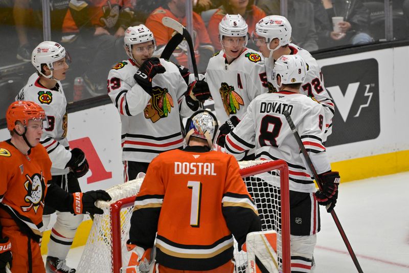 Nov 3, 2024; Anaheim, California, USA; Chicago Blackhawks celebrate after a goal the third period against the Anaheim Ducks at Honda Center. Mandatory Credit: Jayne Kamin-Oncea-Imagn Images