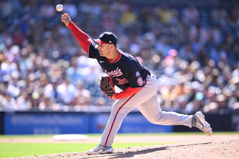 Jun 25, 2023; San Diego, California, USA; Washington Nationals relief pitcher Paolo Espino (30) throws a pitch against the San Diego Padres during the ninth inning at Petco Park. Mandatory Credit: Orlando Ramirez-USA TODAY Sports