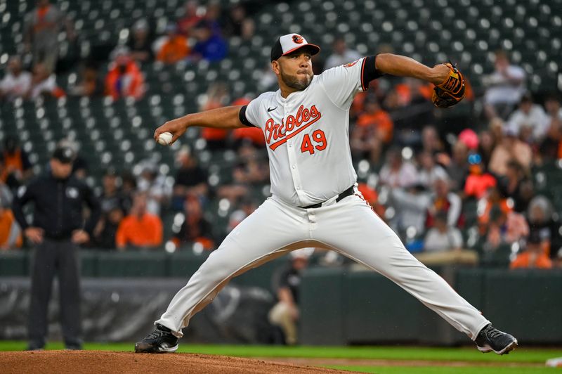 Sep 17, 2024; Baltimore, Maryland, USA;  Baltimore Orioles pitcher Albert Suárez (49) throws a first inning pitch against the San Francisco Giants at Oriole Park at Camden Yards. Mandatory Credit: Tommy Gilligan-Imagn Images