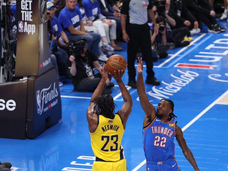 OKLAHOMA CITY, OK - JUNE 8: Aaron Nesmith #23 of the Indiana Pacers shoots a three point basket during the game against the Oklahoma City Thunder  during Game 2 of the 2025 NBA Finals on June 8, 2025 at Paycom Center in Oklahoma City, Oklahoma. NOTE TO USER: User expressly acknowledges and agrees that, by downloading and or using this photograph, User is consenting to the terms and conditions of the Getty Images License Agreement. Mandatory Copyright Notice: Copyright 2025 NBAE (Photo by Joe Murphy/NBAE via Getty Images)