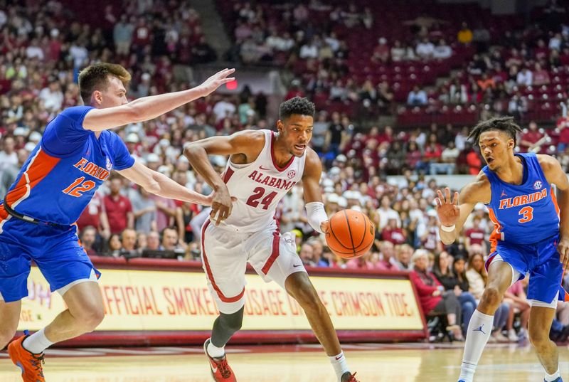 Feb 8, 2023; Tuscaloosa, Alabama, USA; Alabama Crimson Tide forward Brandon Miller (24) drives to the basket against Florida Gators forward Colin Castleton (12) during the second half at Coleman Coliseum. Mandatory Credit: Marvin Gentry-USA TODAY Sports