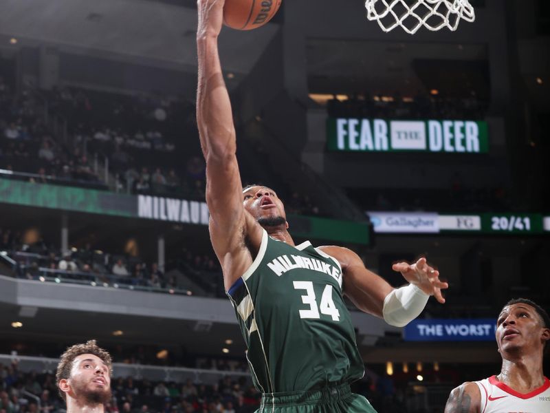 MILWAUKEE, WI - NOVEMBER 18: Giannis Antetokounmpo #34 of the Milwaukee Bucks drives to the basket during the game against the Houston Rockets on November 18, 2024 at the Fiserv Forum Center in Milwaukee, Wisconsin. NOTE TO USER: User expressly acknowledges and agrees that, by downloading and or using this Photograph, user is consenting to the terms and conditions of the Getty Images License Agreement. Mandatory Copyright Notice: Copyright 2024 NBAE (Photo by Gary Dineen/NBAE via Getty Images).