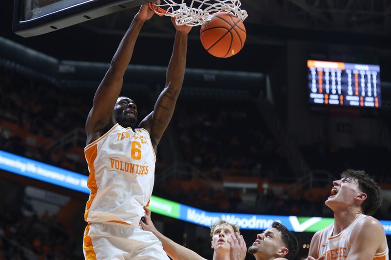Jan 6, 2026; Knoxville, Tennessee, USA;  Tennessee Volunteers forward Dewayne Brown II (6) dunks the ball against the Texas Longhorns during the first half at Thompson-Boling Arena at Food City Center. Mandatory Credit: Randy Sartin-Imagn Images