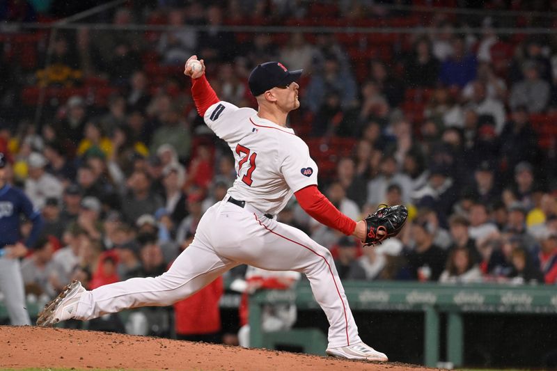 May 15, 2024; Boston, Massachusetts, USA; Boston Red Sox pitcher Cam Booser (71) pitches against the Tampa Bay Rays during the seventh inning at Fenway Park. Mandatory Credit: Eric Canha-USA TODAY Sports