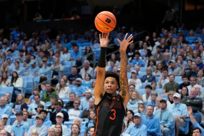 Mar 1, 2025; Chapel Hill, North Carolina, USA;  Miami (Fl) Hurricanes guard Jalil Bethea (3) shoots in the first half at Dean E. Smith Center. Mandatory Credit: Bob Donnan-Imagn Images