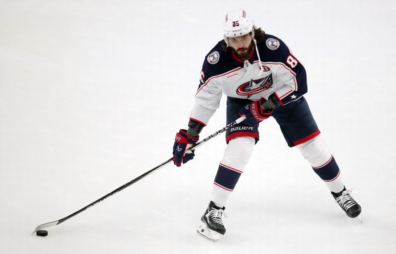 Jan 7, 2025; Pittsburgh, Pennsylvania, USA; Columbus Blue Jackets right wing Kirill Marchenko (86) warms up before the game against the Pittsburgh Penguins at PPG Paints Arena. Mandatory Credit: Charles LeClaire-Imagn Images