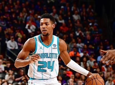 PHOENIX, AZ - DECEMBER 29:Brandon Miller #24 of the Charlotte Hornets dribbles the ball during the game against the Phoenix Suns  on December 29 2023 at Footprint Center in Phoenix, Arizona. NOTE TO USER: User expressly acknowledges and agrees that, by downloading and or using this photograph, user is consenting to the terms and conditions of the Getty Images License Agreement. Mandatory Copyright Notice: Copyright 2023 NBAE (Photo by Barry Gossage/NBAE via Getty Images)