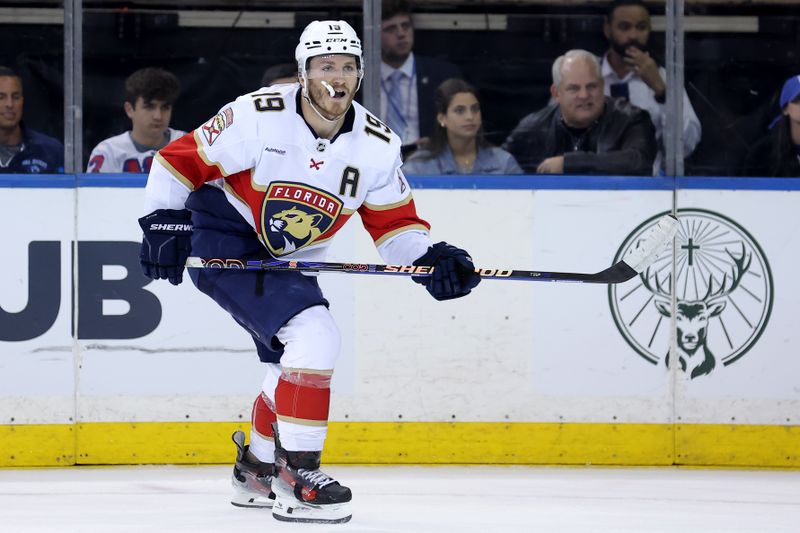 May 22, 2024; New York, New York, USA; Florida Panthers left wing Matthew Tkachuk (19) skates against the New York Rangers during the second period of game one of the Eastern Conference Final of the 2024 Stanley Cup Playoffs at Madison Square Garden. Mandatory Credit: Brad Penner-USA TODAY Sports