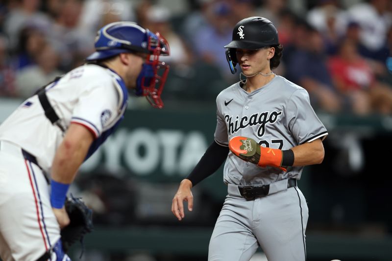 Jul 25, 2024; Arlington, Texas, USA; Chicago White Sox second base Brooks Baldwin (27) scores a run against the Texas Rangers in the third inning at Globe Life Field. Mandatory Credit: Tim Heitman-USA TODAY Sports