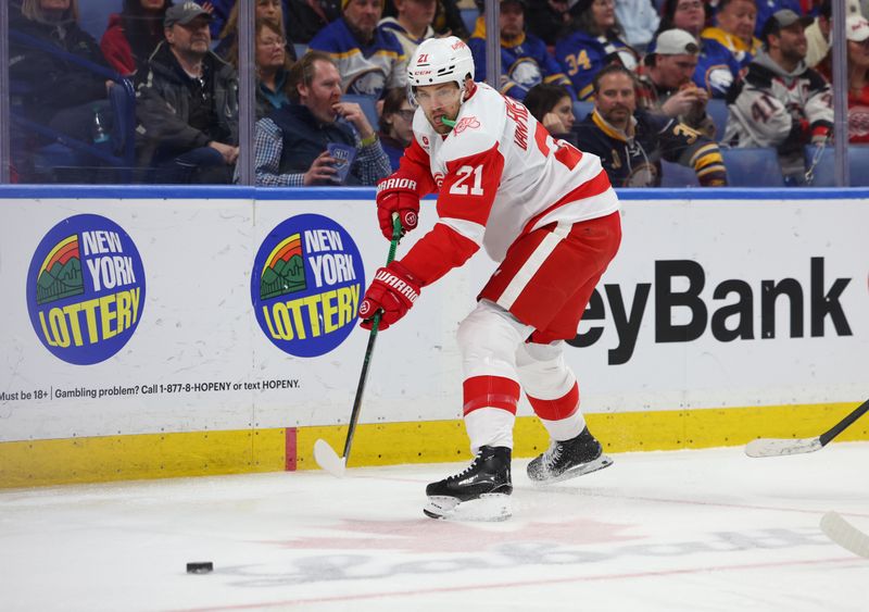 Mar 27, 2026; Buffalo, New York, USA;  Detroit Red Wings left wing James van Riemsdyk (21) makes a pass during the third period ab at KeyBank Center. Mandatory Credit: Timothy T. Ludwig-Imagn Images