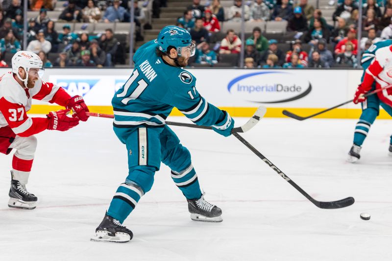 Nov 18, 2024; San Jose, California, USA; San Jose Sharks center Luke Kunin (11) scores a goal during the third period against the Detroit Red Wings at SAP Center at San Jose. Mandatory Credit: Bob Kupbens-Imagn Images