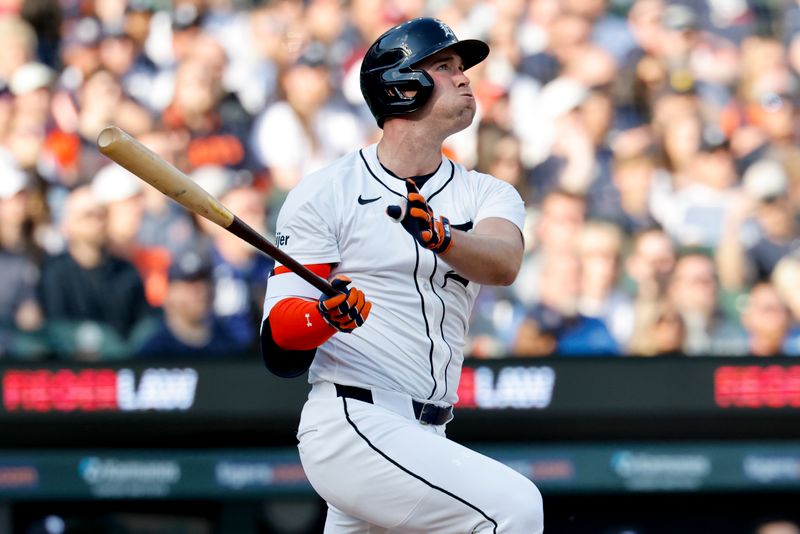 May 10, 2025; Detroit, Michigan, USA;   Detroit Tigers Kerry Carpenter (30) hits a home run in the first inning against the Texas Rangers at Comerica Park. Mandatory Credit: Rick Osentoski-Imagn Images